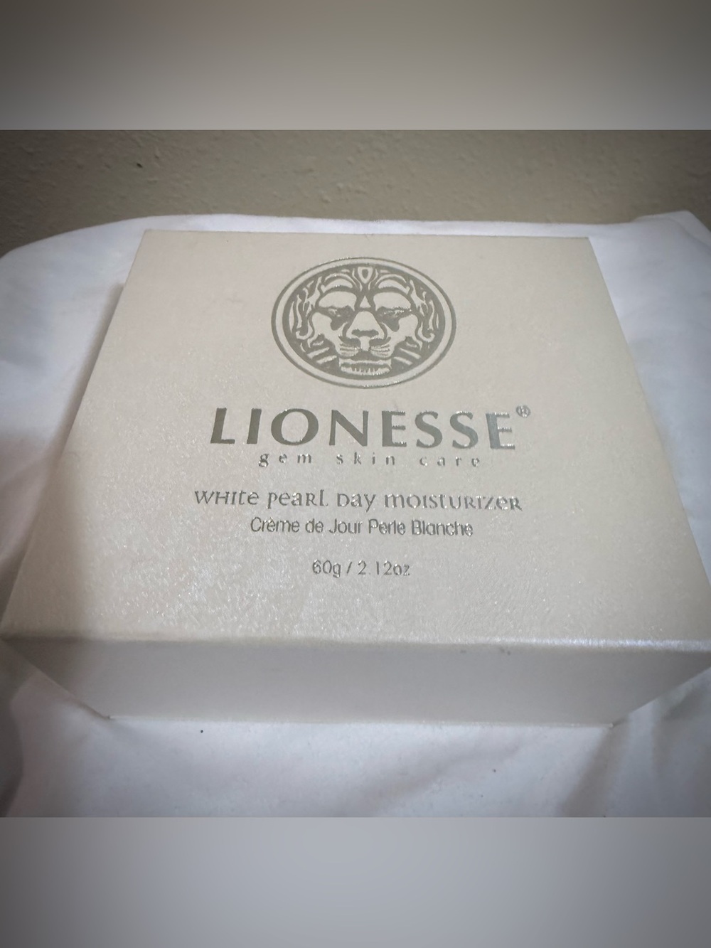 Lioness White Pearl Day Moisturizer — cream white and silver packaging